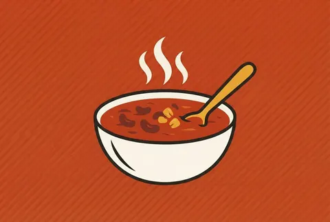 a steaming bowl of chili on a red-orange card
