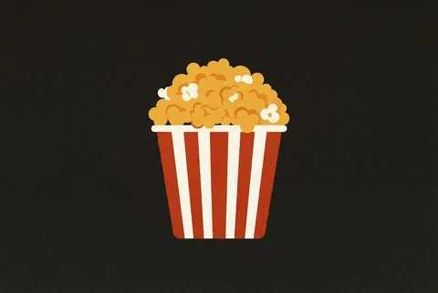 a striped popcorn bucket on an ink card