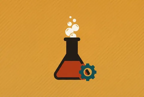 a science flask with bubbles and a gear on a marigold card